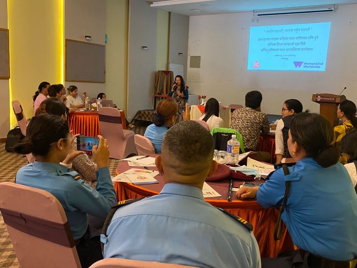 Deputy mayor of Lalitpur metropolitan city standing infront of the all participants and delivering her speech
