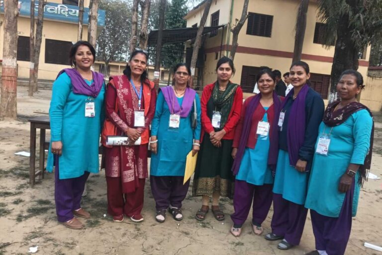 The election commission staff are posing with Anita Dhungana from NDWA Kailali who was appointed as GEDSI Observer during the HOR Elections in Krishnapur, Kailali.